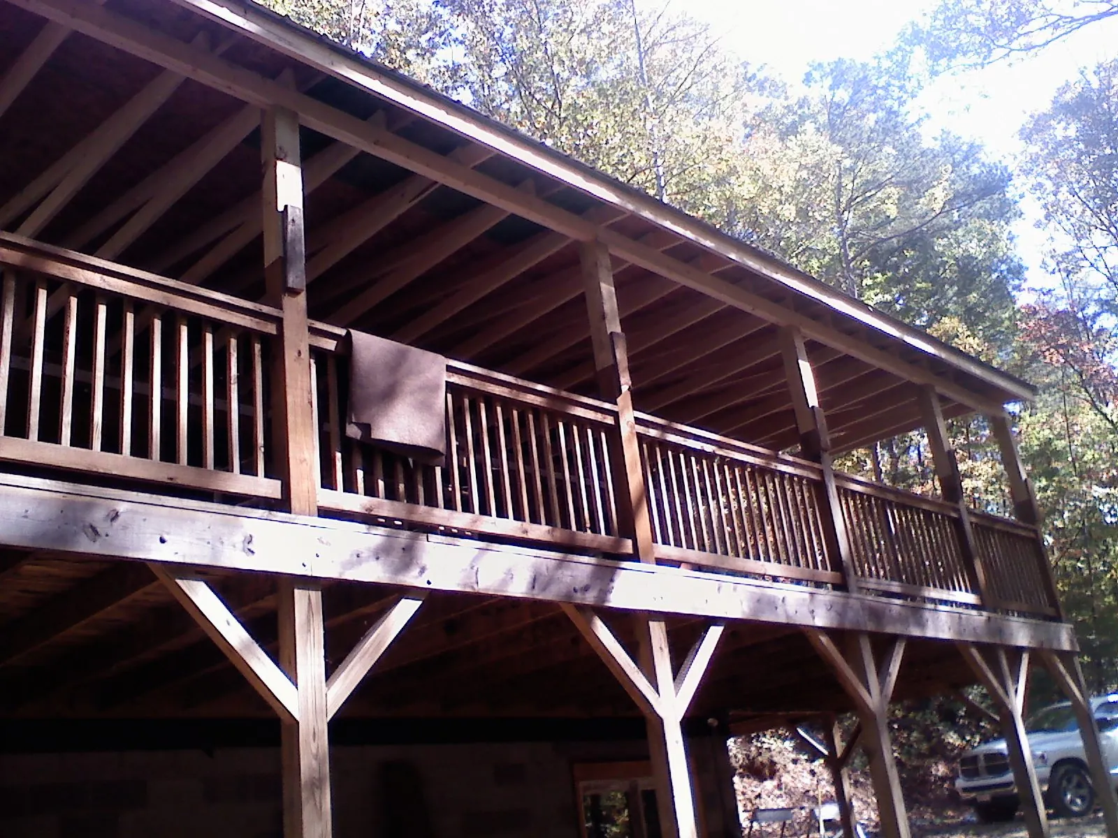 Timber framing under a new elevated porch and deck — Roof Leak Repair in East Bernard by Roofing Brothers